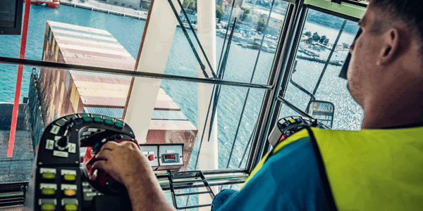 Business professional analyzing revenue data on a digital dashboard.